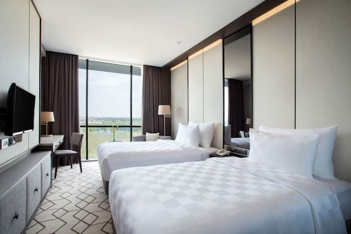 Guest room at the Wyndham Opi Hotel Palembang in Palembang, Other than US/Canada